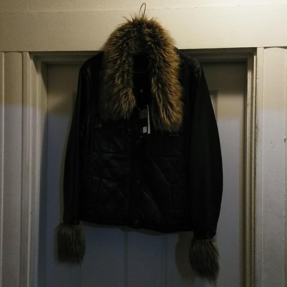 Black members only fur coat.